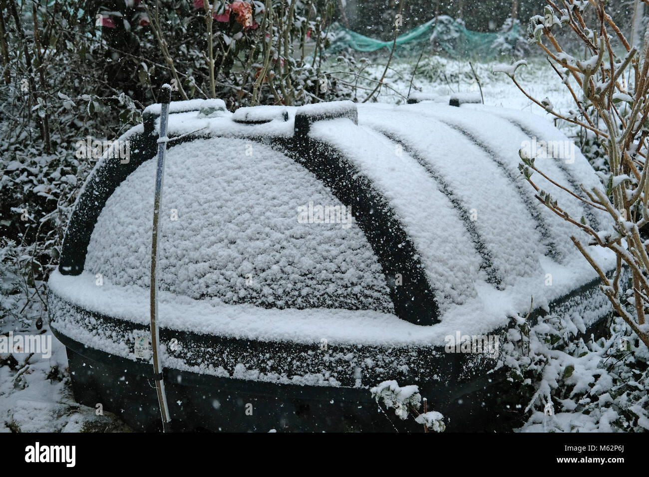 An oil tank covered in snow Stock Photo Alamy