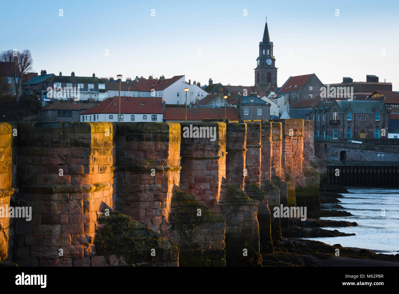 Old Bridge UK, view at sunrise of the old 17th Century bridge across the Tweed leading to the town of Berwick upon Tweed, Northumberland, England Stock Photo