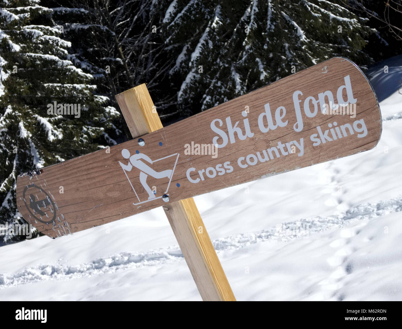 A sign for cross country skiing or ski de fond trails at Mont Caly in the Les Gets  ski area of the Portes de Soleil in the Haute Savoie region of the Stock Photo