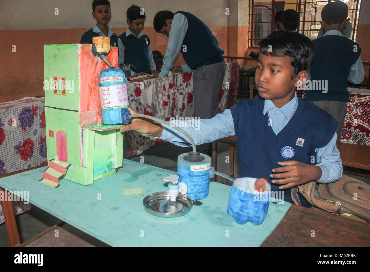 Guwahati, India. 28th Feb, 2018. Students showcased their invention model in a science exhibition during National Science Day at Assam Jatiya Vidyalaya. National Science Day is celebrated every year in India on February 28th, a date which marks the discovery of the Raman Effect by Indian physicist Sir Chandrasekhara Venkata Raman. Parents and other members of the school community who attended the fair were impressed with the presentations made by our young scientists. Credit: David Talukdar/Pacific Press/Alamy Live News Stock Photo