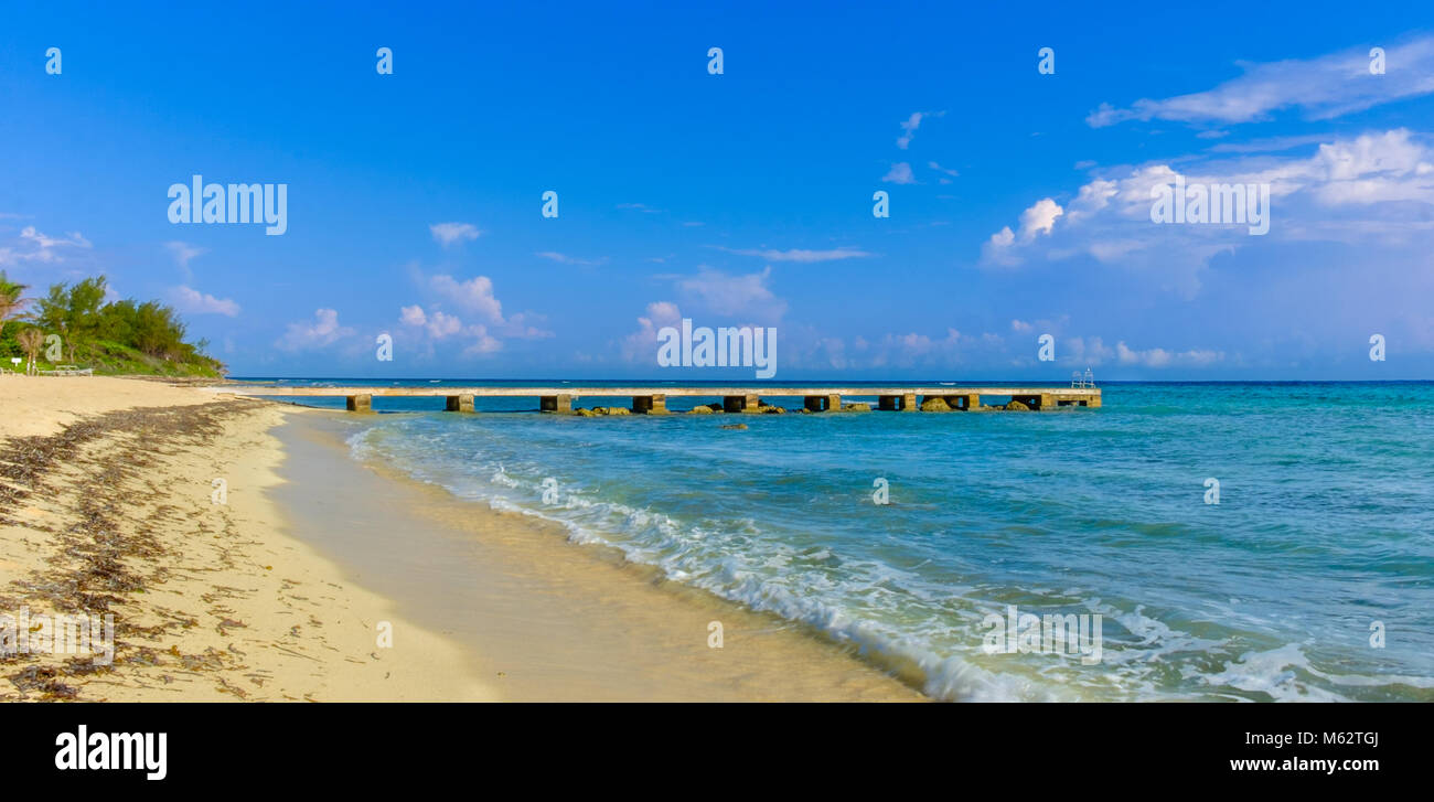 Pier on one of West Bay's beaches in the Caribbean, Grand Cayman, Cayman Islands Stock Photo