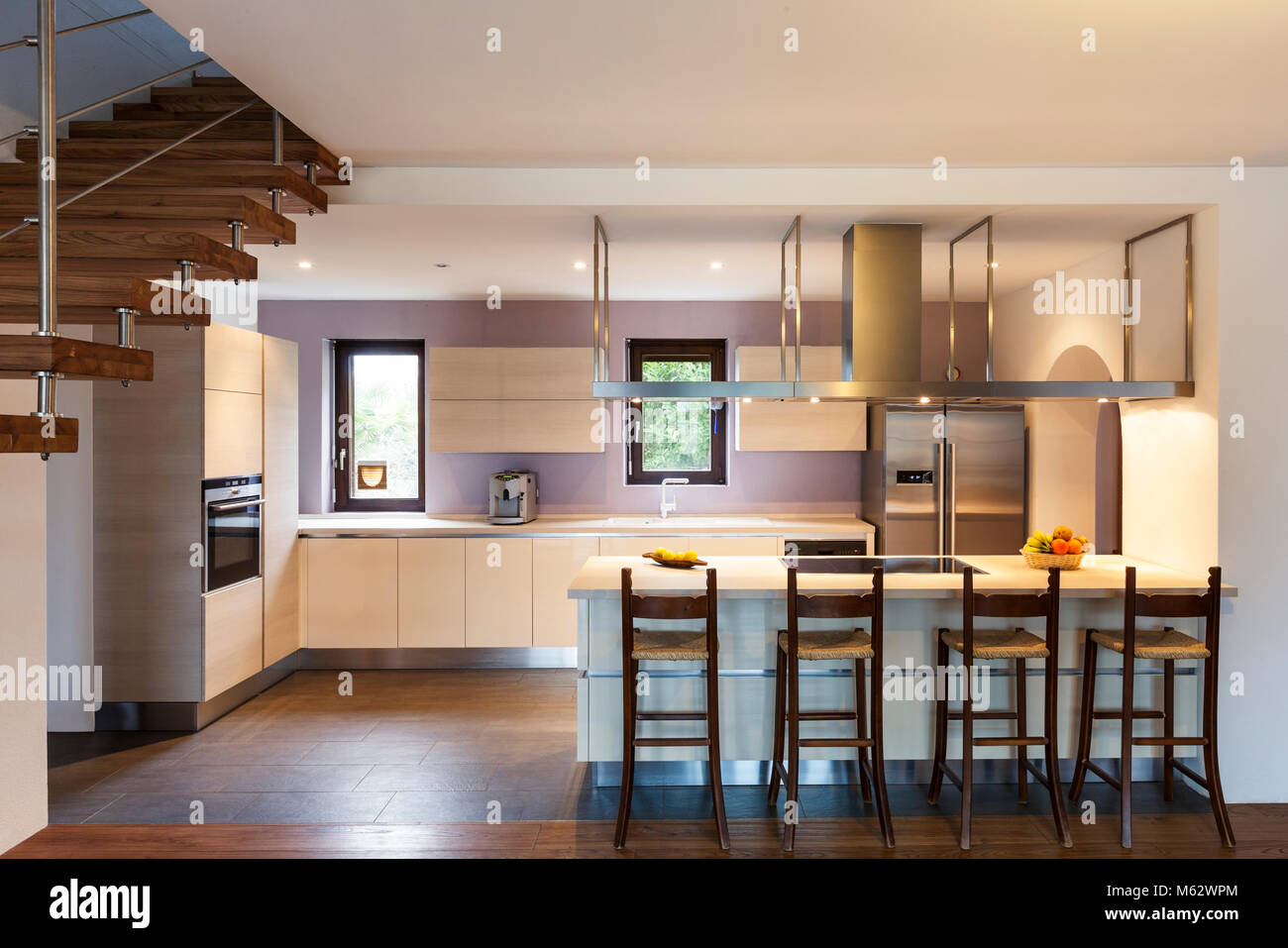 Beautiful modern loft, view of the kitchen Stock Photo