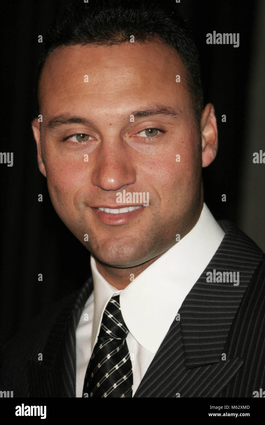 New York Yankees Derek Jeter fields a ground ball during fielding practice  at their spring training camp in Tampa, FL on February 26, 2006. (UPI  Photo/Frank Polich Stock Photo - Alamy