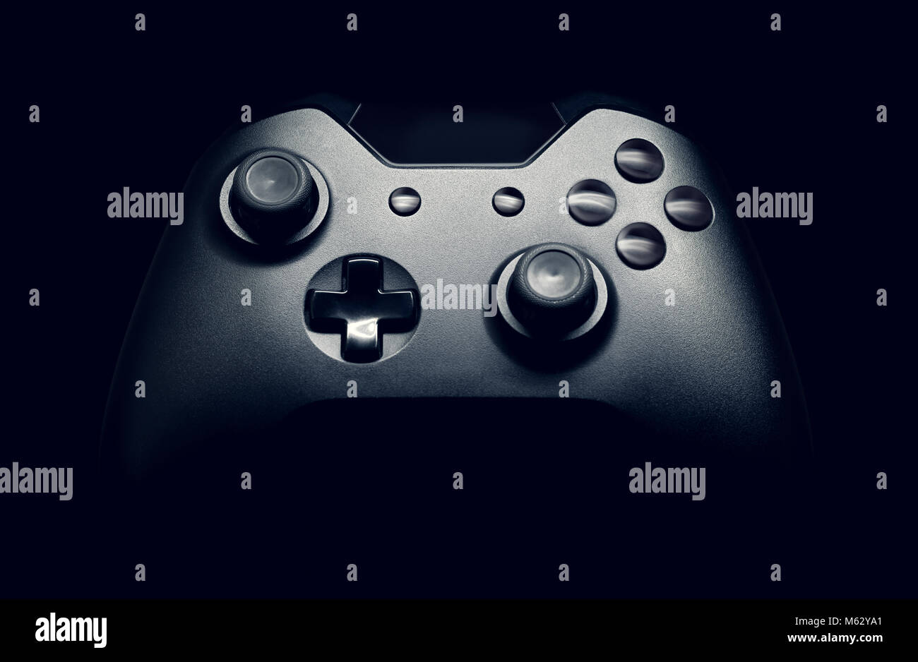 Neat gamepad on black background - close up studio shot Stock Photo - Alamy