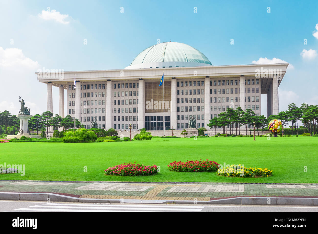 SEOUL, KOREA - AUGUST 14, 2015: Building of National Assembly Proceeding Hall - South Korean Capitol building - located on Yeouido island - Seoul, Kor Stock Photo