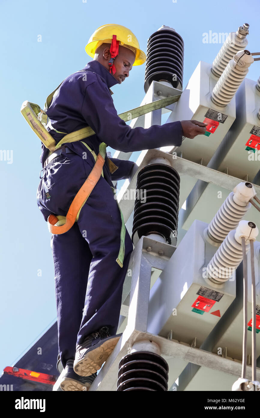 Electricians working on high voltage power lines. Highly skilled