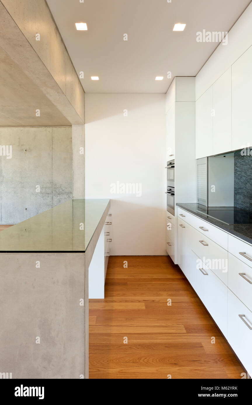 modern concrete house , kitchen, concrete table Stock Photo - Alamy