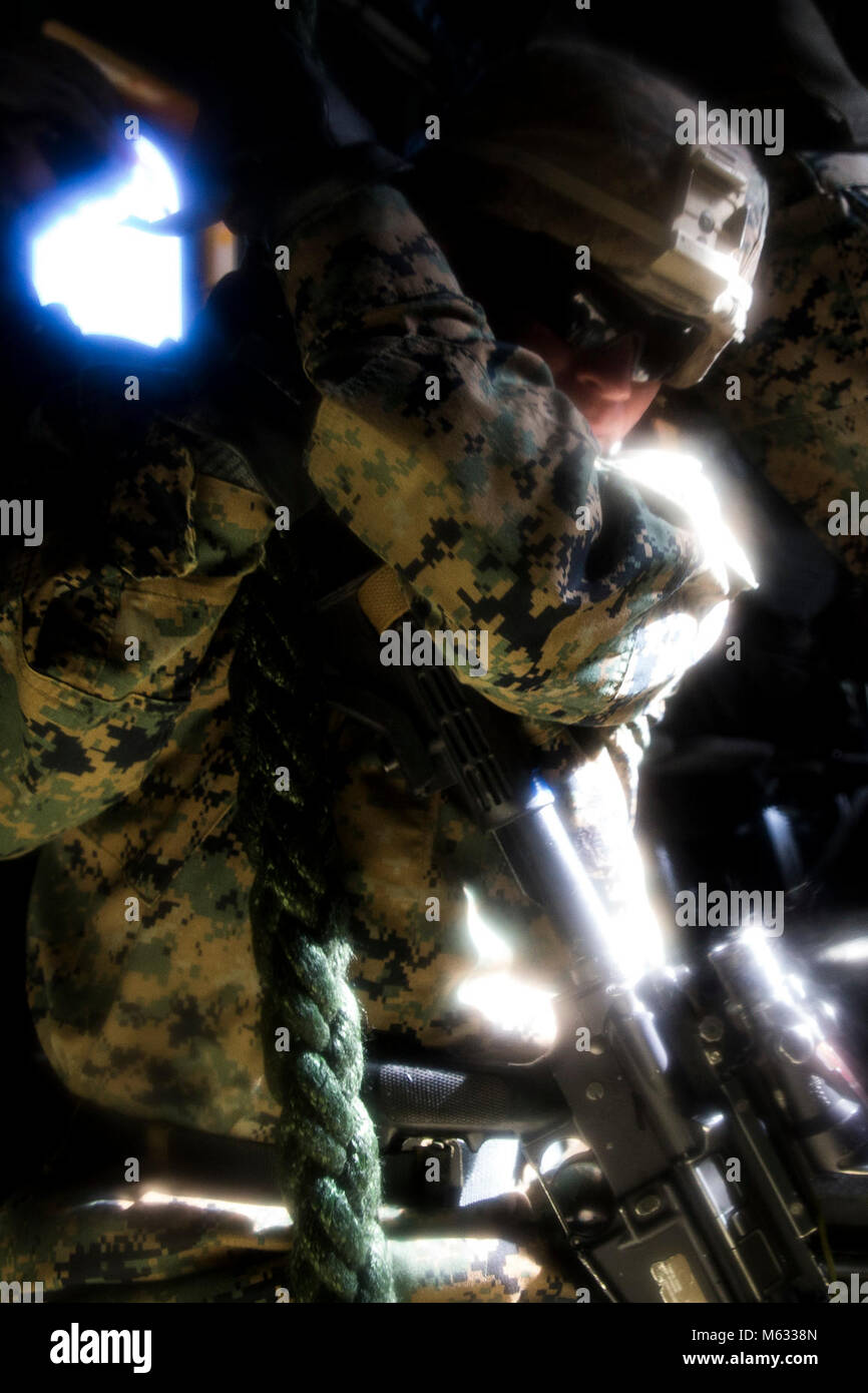 A U.S. Marine Corps mortar man with Weapons Company, 1st Battalion, 3rd ...