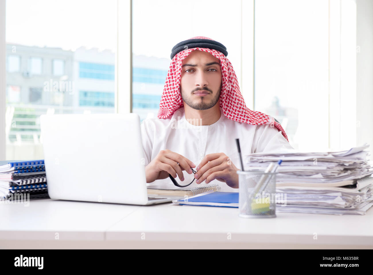 Arab businessman working in the office Stock Photo - Alamy