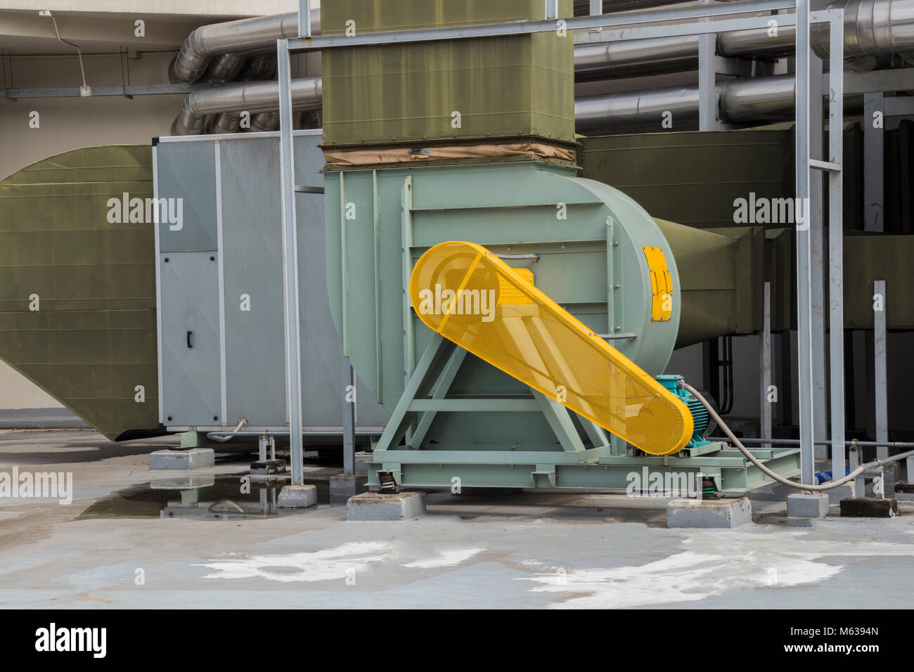 Yellow safety guard motor of air blower for building Stock Photo Alamy