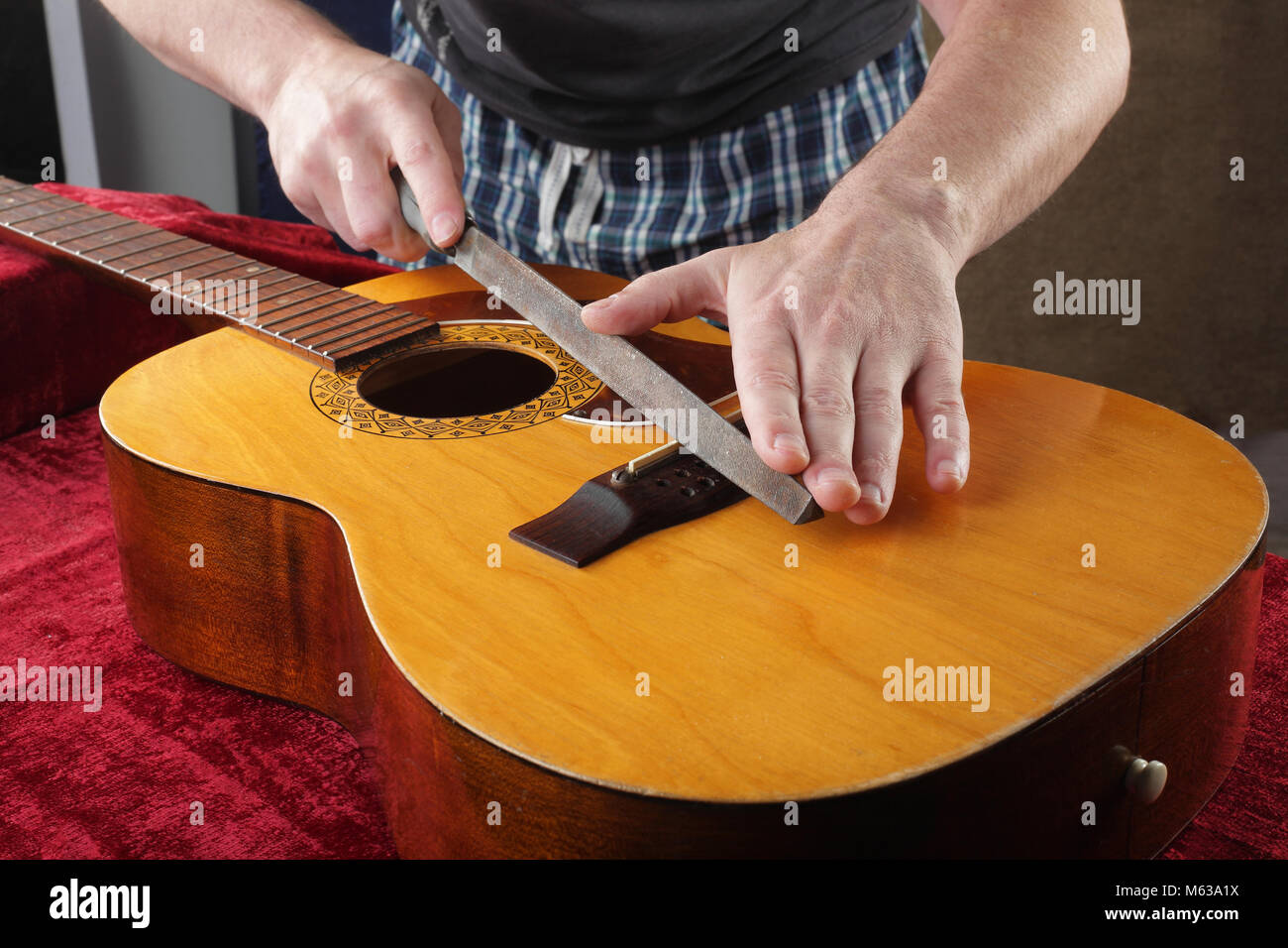 Musical instrument guitar repair and service Grinding bridge nut