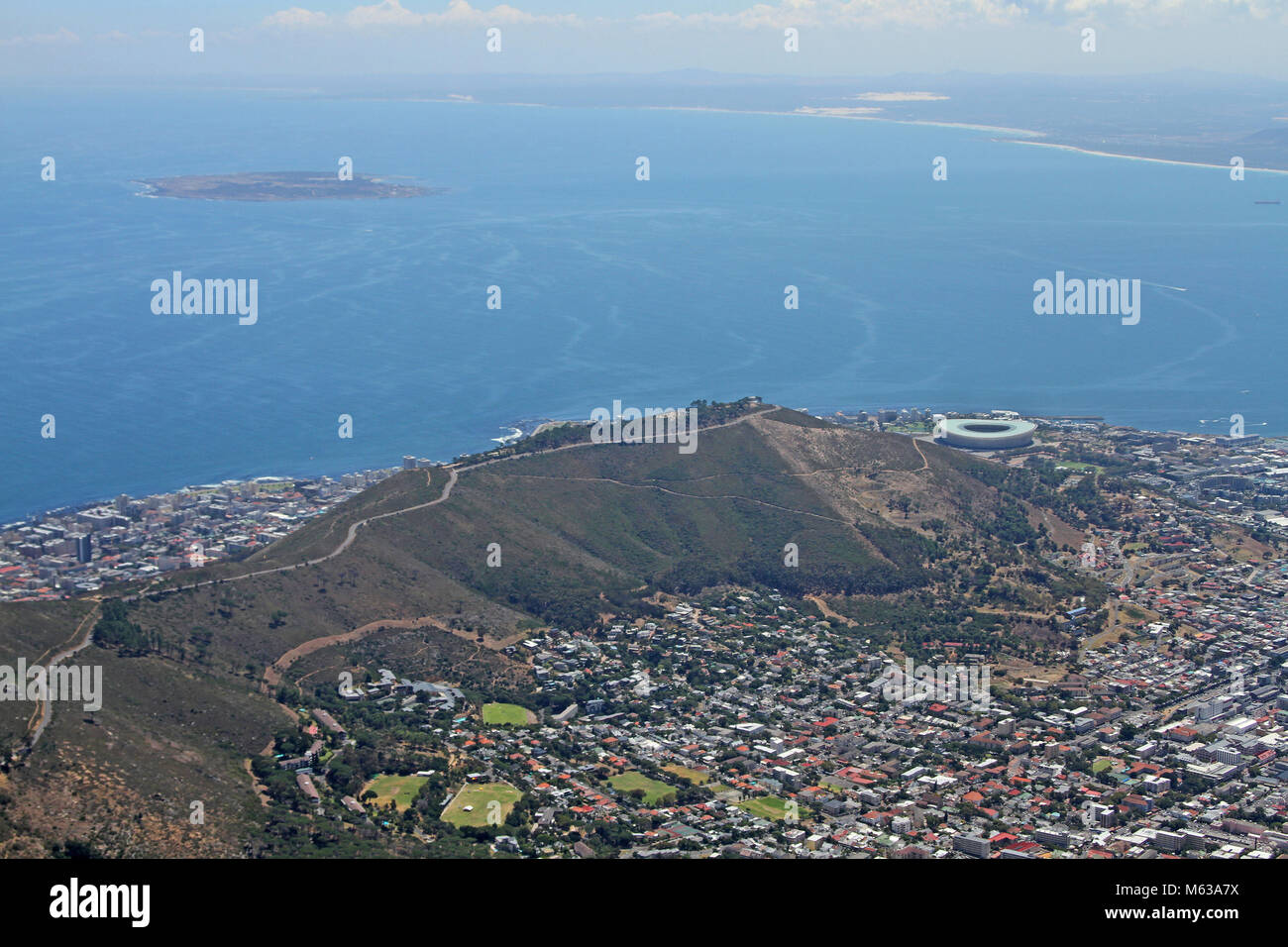 View of Signal Hill, Cape Town Stadium and Robben Island from the top of Table Mountain, Cape Town, Western Cape, South Africa. Stock Photo
