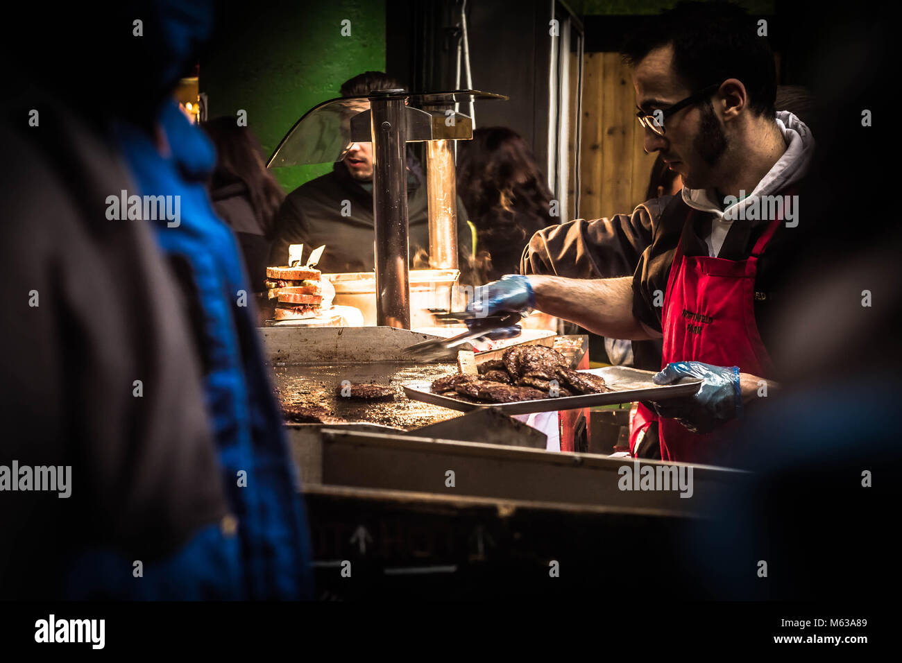 Burgers being cooked at Borough Market, London, UK Stock Photo