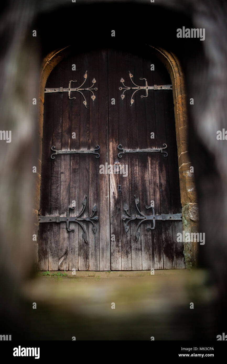 Wooden / oak doors locked from outside at church in Deddington Stock Photo
