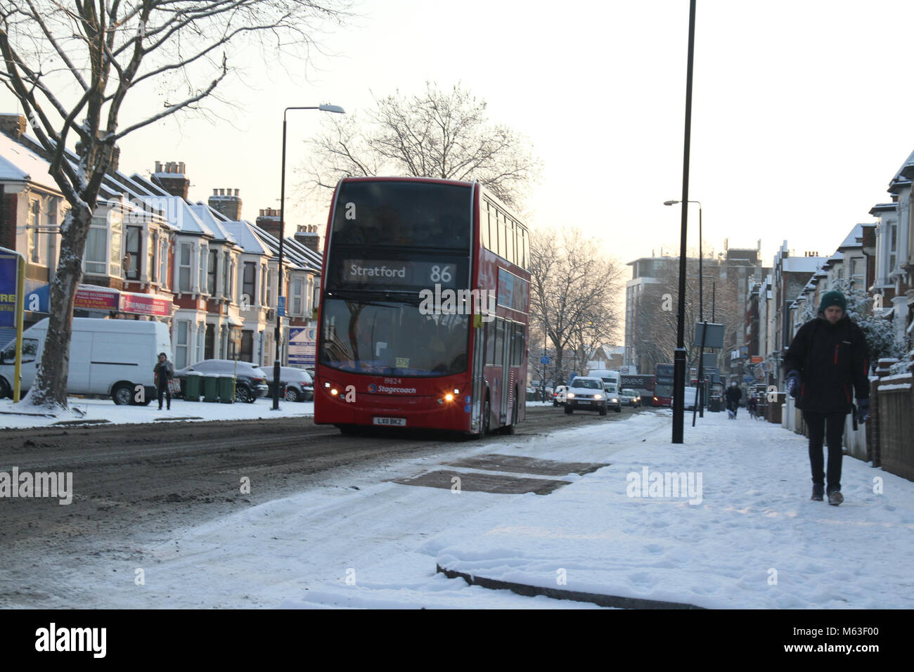LONDON, UK - February 28: Streets of East London were covered with snow following  a shower on 28 February. The Met Department issued an amber warning causing airport closure and rail cancellation Credit: David Mbiyu/Alamy Live News Stock Photo