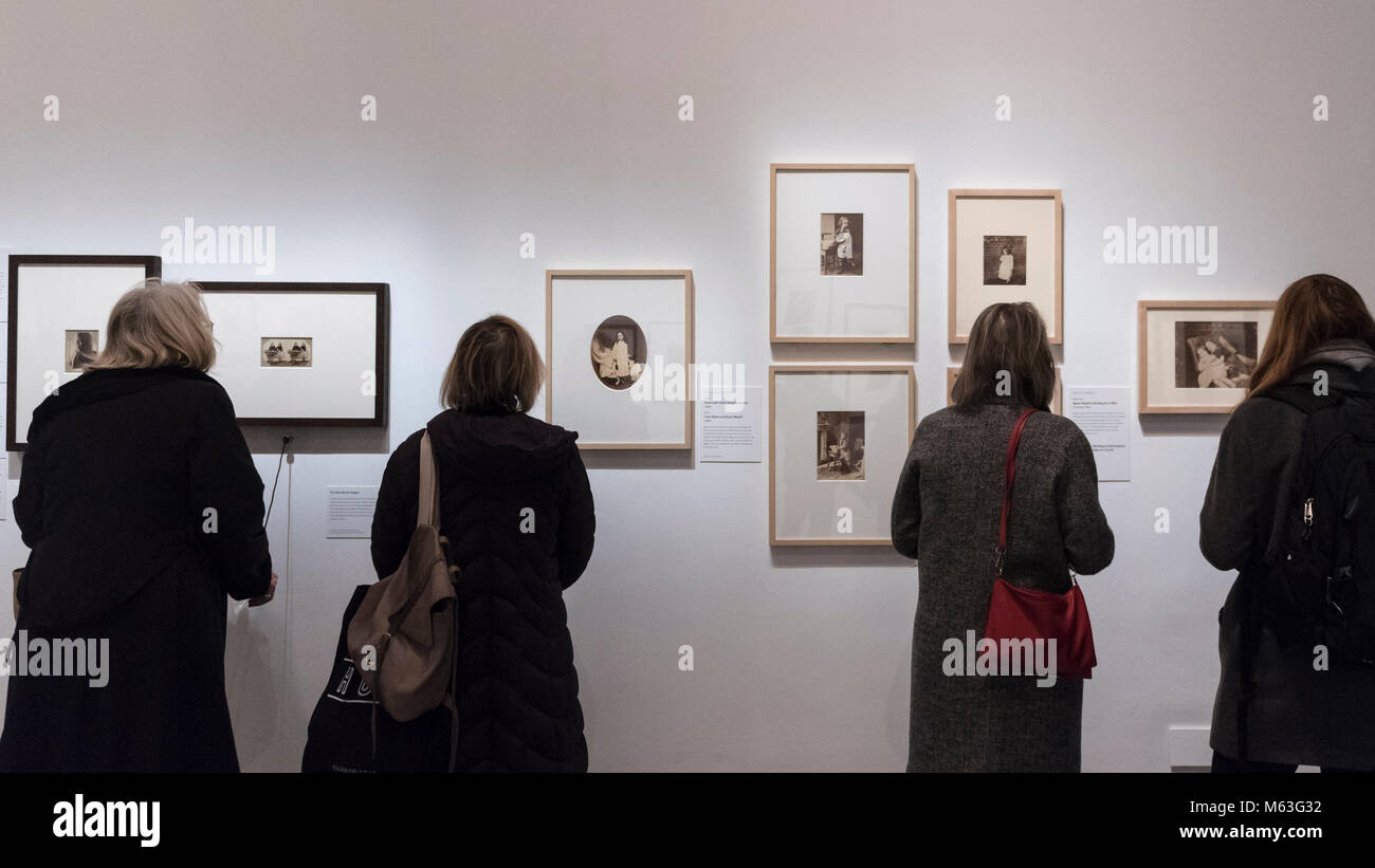 London, UK.  28 February 2018.  Visitors view images at the preview of 'Victorian Giants:  The Birth of Art Photography' at the National Portrait Gallery featuring works by Lewis Carroll, Julia Margaret Cameron, Oscar Rejlander and Clementina Hawarden. Credit: Stephen Chung/Alamy Live News Stock Photo