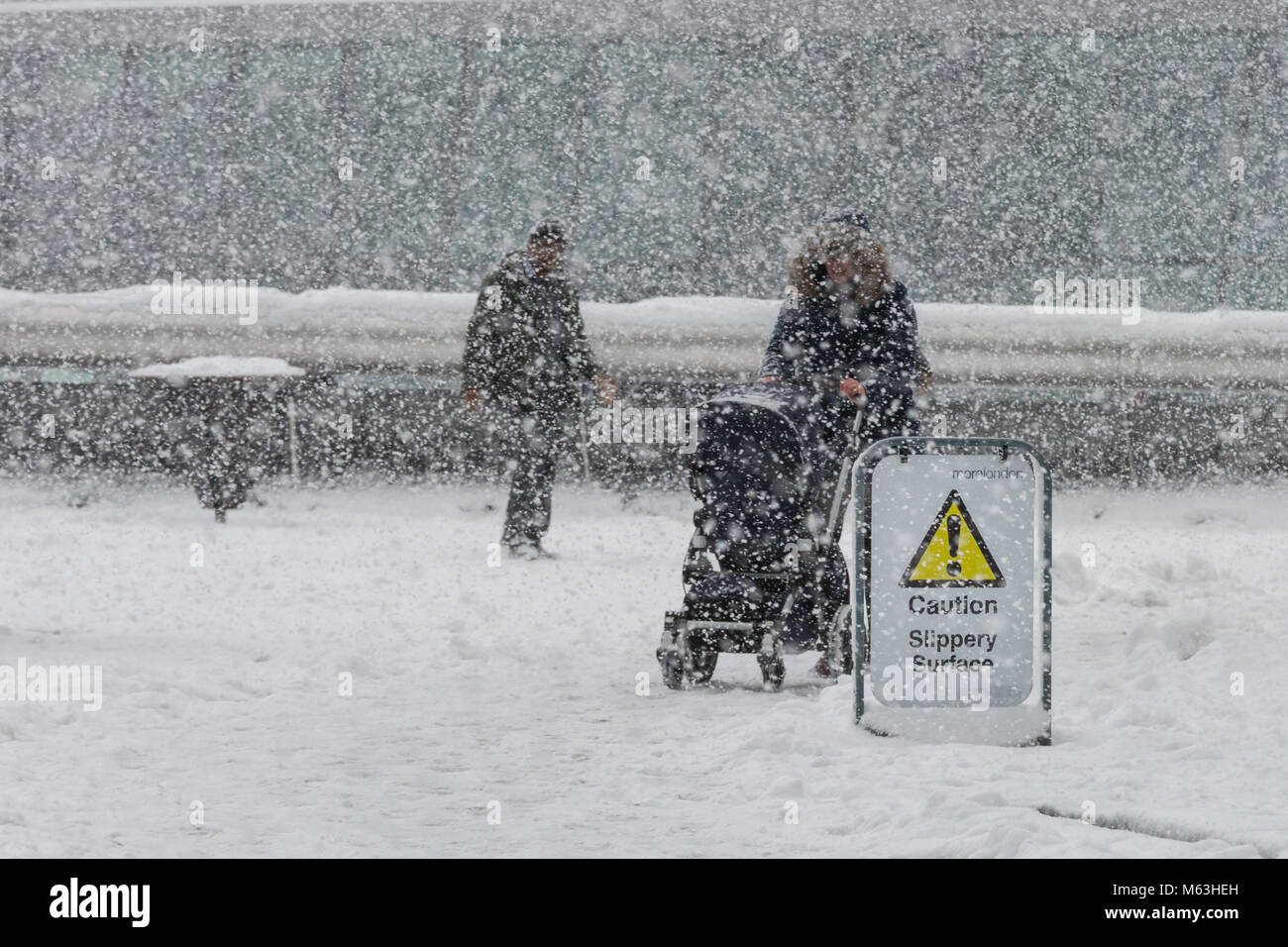 London, 28th Feb 2018. Londoners and tourists around City Hall and More London struggle through a heavy snow storm as the 'Beast from the East' takes hold of London. Credit: Imageplotter News and Sports/Alamy Live News Stock Photo