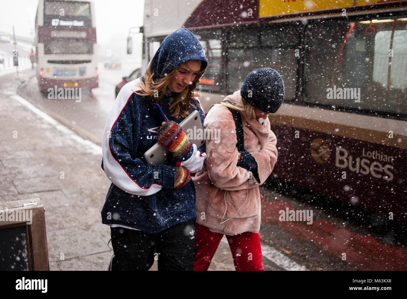 Edinburgh, Scotland. 28th of February 2018. UK weather: Snow showers due to "Beast from the East" on city of Edinburgh. People walking on the streets of Edinburgh. The expectations for the day are more snow showers because of the weather fenomenon "Beast from the East". Credit: Pep Masip/Alamy Live News Stock Photo