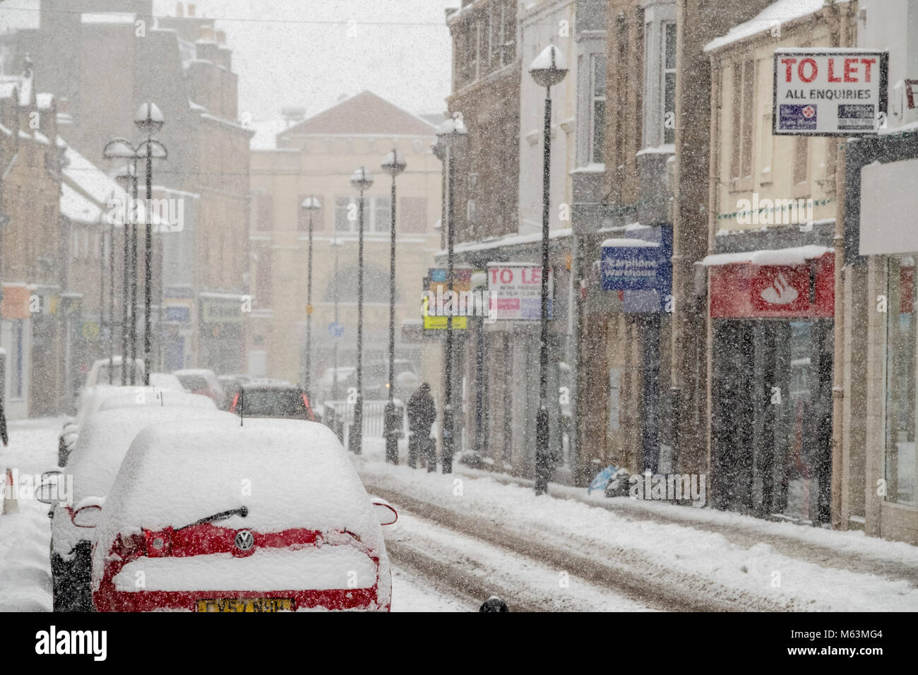 Galashiels, Galashiels, UK. 28.Feb.2018.   Beast from the East Storm hits Scottish Borders Caption: Blizzard conditions sweep across the Scottish Borders  Galashiels town centre, shops close early snow covered cars parked (Photo: Rob Gray) Credit: Rob Gray/Alamy Live News Stock Photo