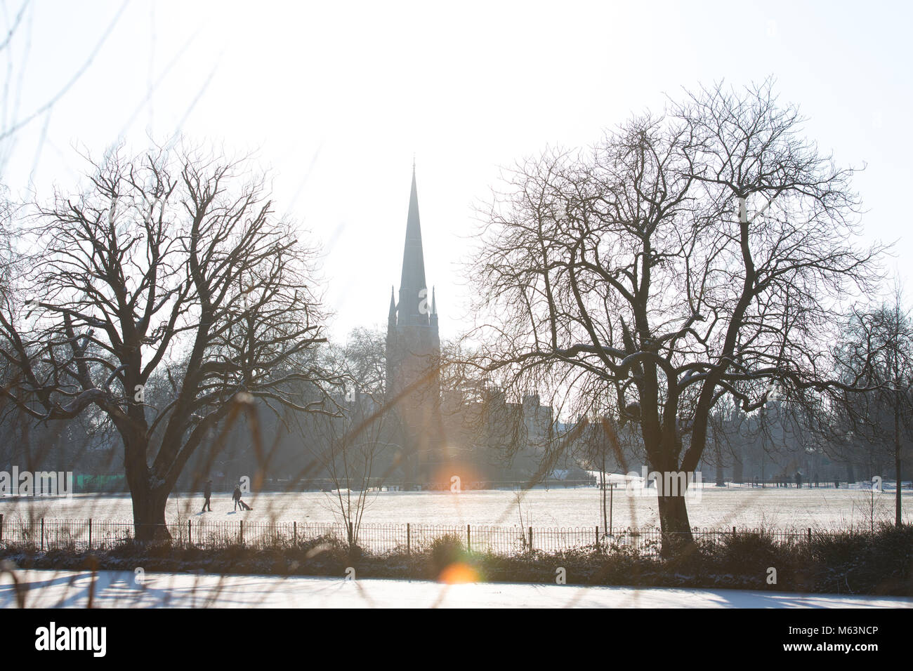London, UK. 28th February 2018. UK weather, snow in Stoke Newington. St MAry's church seen from through snow covered Clissold Park. Credit: Carol Moir/Alamy Live News. Stock Photo
