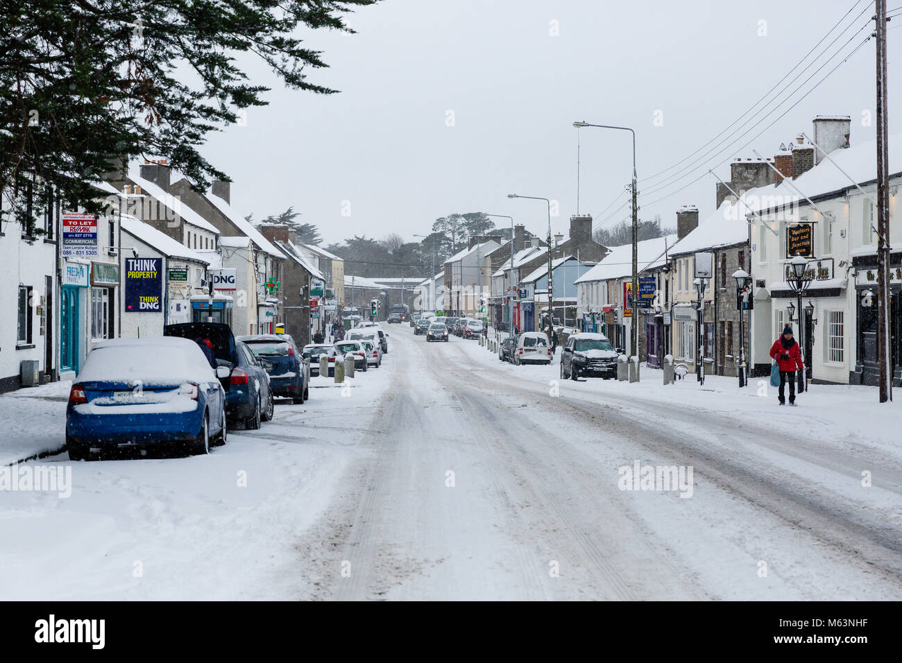 Celbridge, Kildare, Ireland. 28 Feb 2018: Main street in Celbridge covered in snow as extreme weather conditions continue across Ireland. Beast from the east hits Irish towns. Heavy snow fall in Celbridge county Kildare. Stock Photo