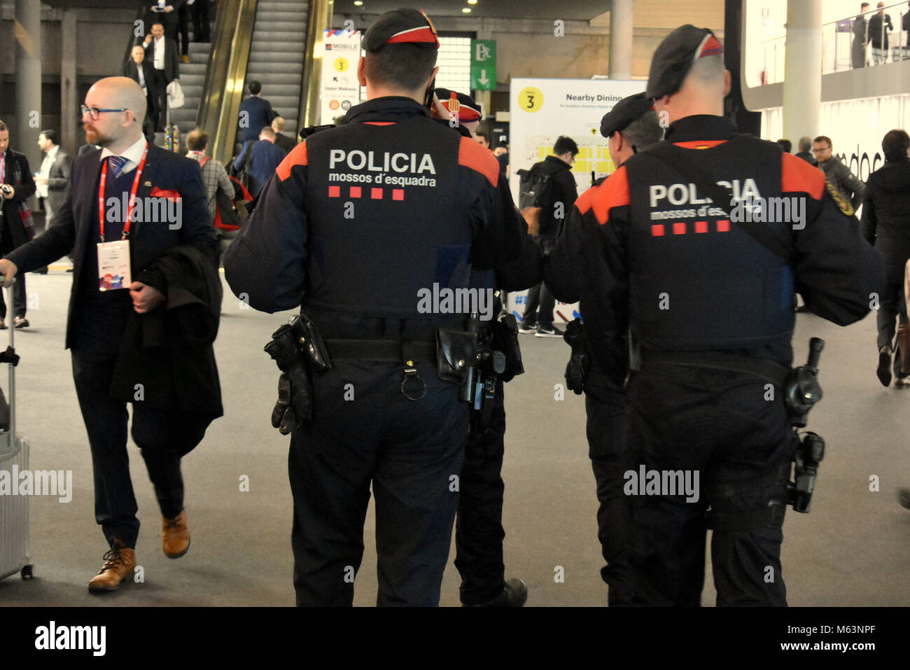 Barcelona, Spain. 28th Feb, 2018. Catalan police officer seen on duty at the Mobile World Congress.The Mobile World Congress 2018 is being hosted in Barcelona from 26 February to 1st March. Credit: Third day at Mobile Word Congress in Barcelona Ramon Costa  4 .jpg/SOPA Images/ZUMA Wire/Alamy Live News Stock Photo