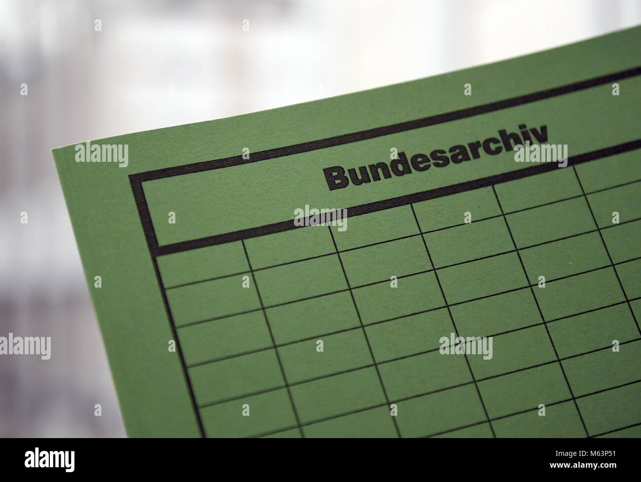 13 February 2018, Germany, Berlin: A file reads 'Bundesarchiv' (lit. federal archives) at the German Federal Archives. Thousands of documents and writings from the Socialist Unity Party of Germany's innermost circle of power were read and sighted by the Federal archives. Interested people are able to learn a lot about the Germany Democratic Republic's (GDR) history. Photo: Britta Pedersen/dpa Stock Photo