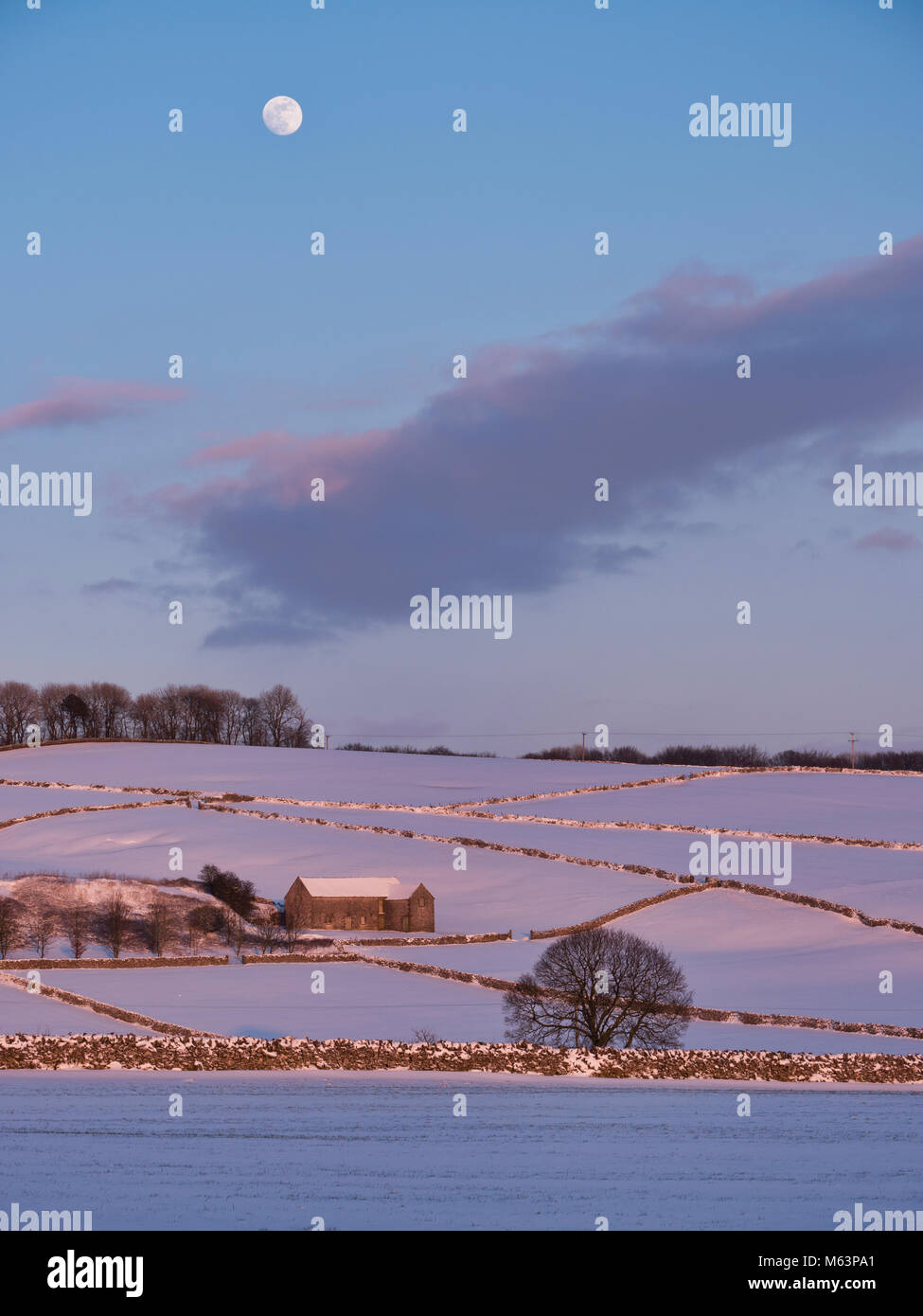 Peak District National Park, Derbyshire, UK. 28th February, 2018. UK Weather: Beast From The East snow & ice conditions, cold blue sky & bright moon near Alsop en le Dale on the A515 road between Buxton & Ashbourne in the Peak District National Park, Derbyshire Credit: Doug Blane/Alamy Live News Stock Photo