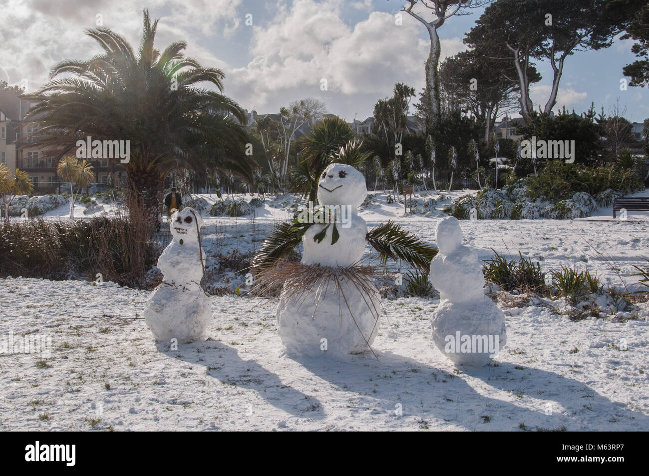Falmouth, UK. 28th February 2018. Snowmen built among the palm trees in Queen Mary Gardens during a cold snap, Falmouth, Cornwall. Lisa Söderström/Alamy Live News Stock Photo