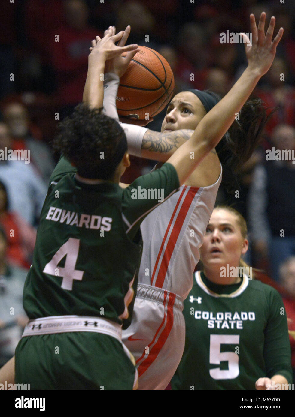 U.S. 27th Feb, 2018. SPORTS -- UNM's Cherise Beynon drives for a shot past Colorado States Jordyn Edwards, 4, during the game in The Pit on Tuesday, February 27, 2018. Credit: Greg Sorber/Albuquerque Journal/ZUMA Wire/Alamy Live News Stock Photo