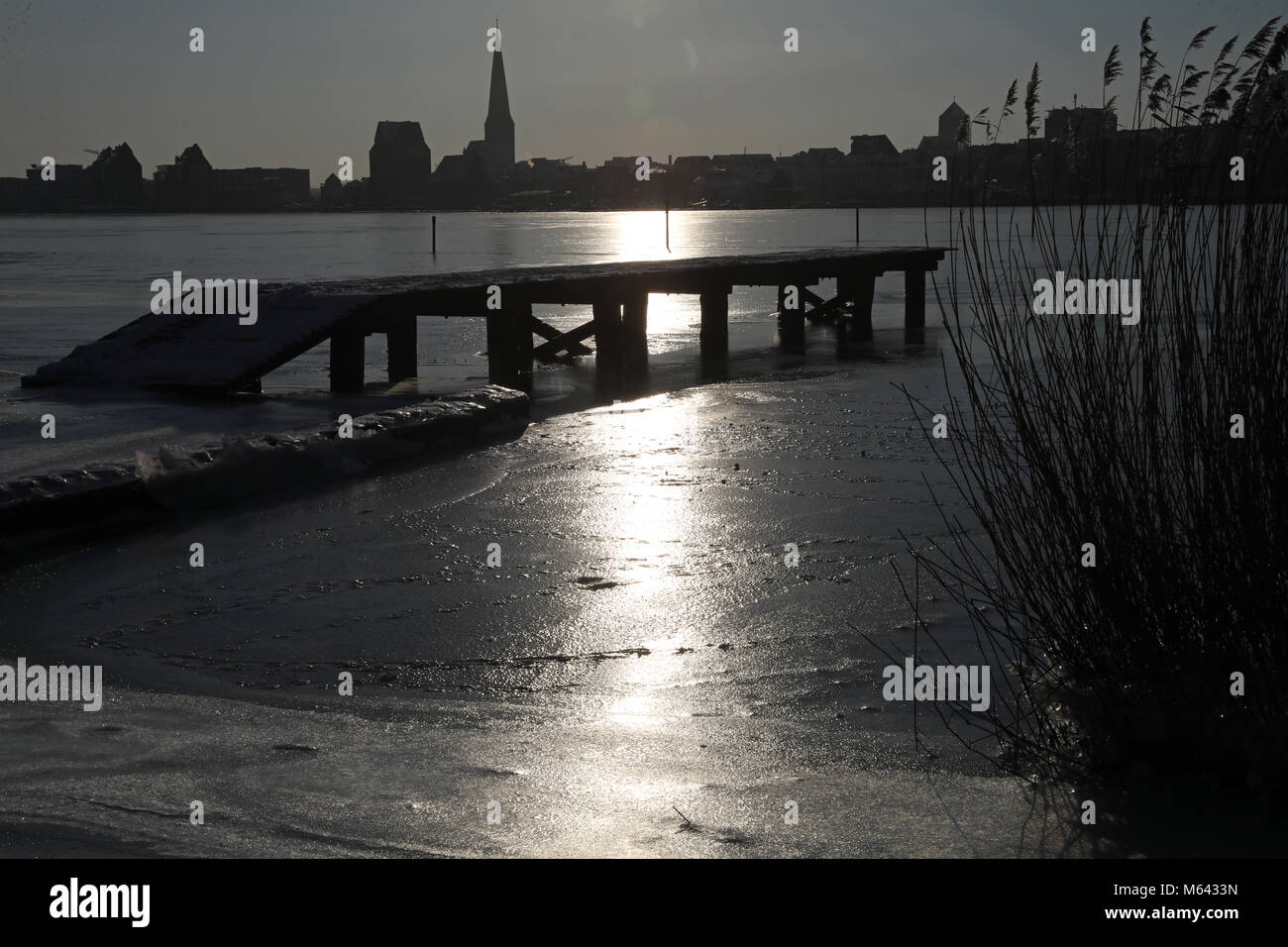 The sun being reflected by the ice of the Warnow river, along the