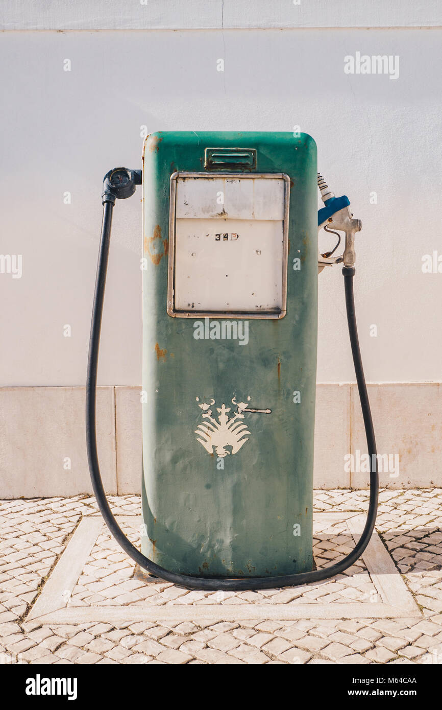 Vintage old gasoline pump and oil dispenser Stock Photo Alamy
