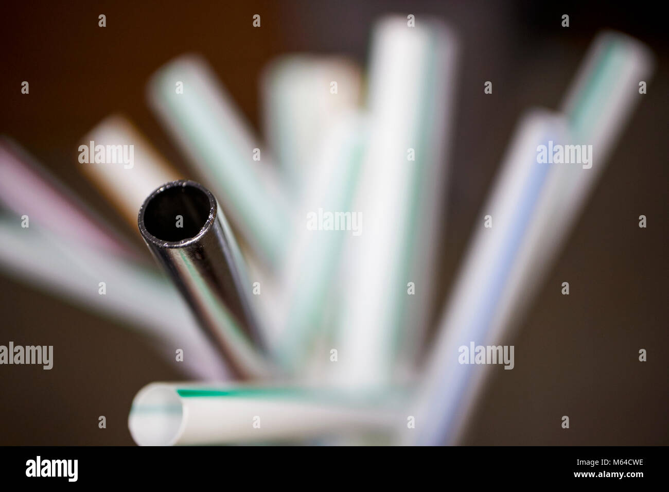 reusable metal straw with plastic straws in the uk Stock Photo