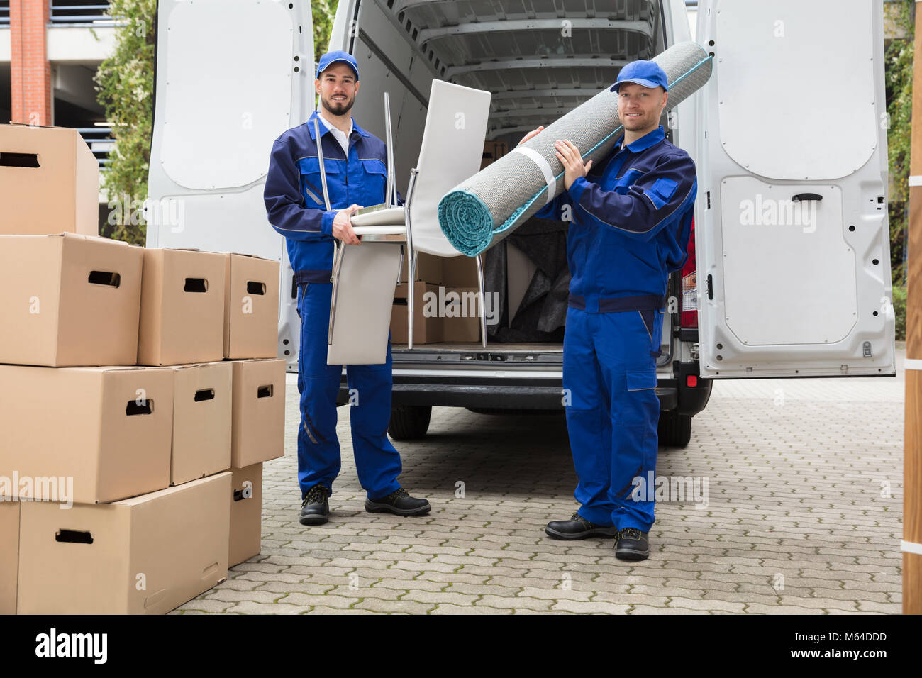 Man Delivering Rug Two men carrying carpet hi-res stock photography and images - Alamy