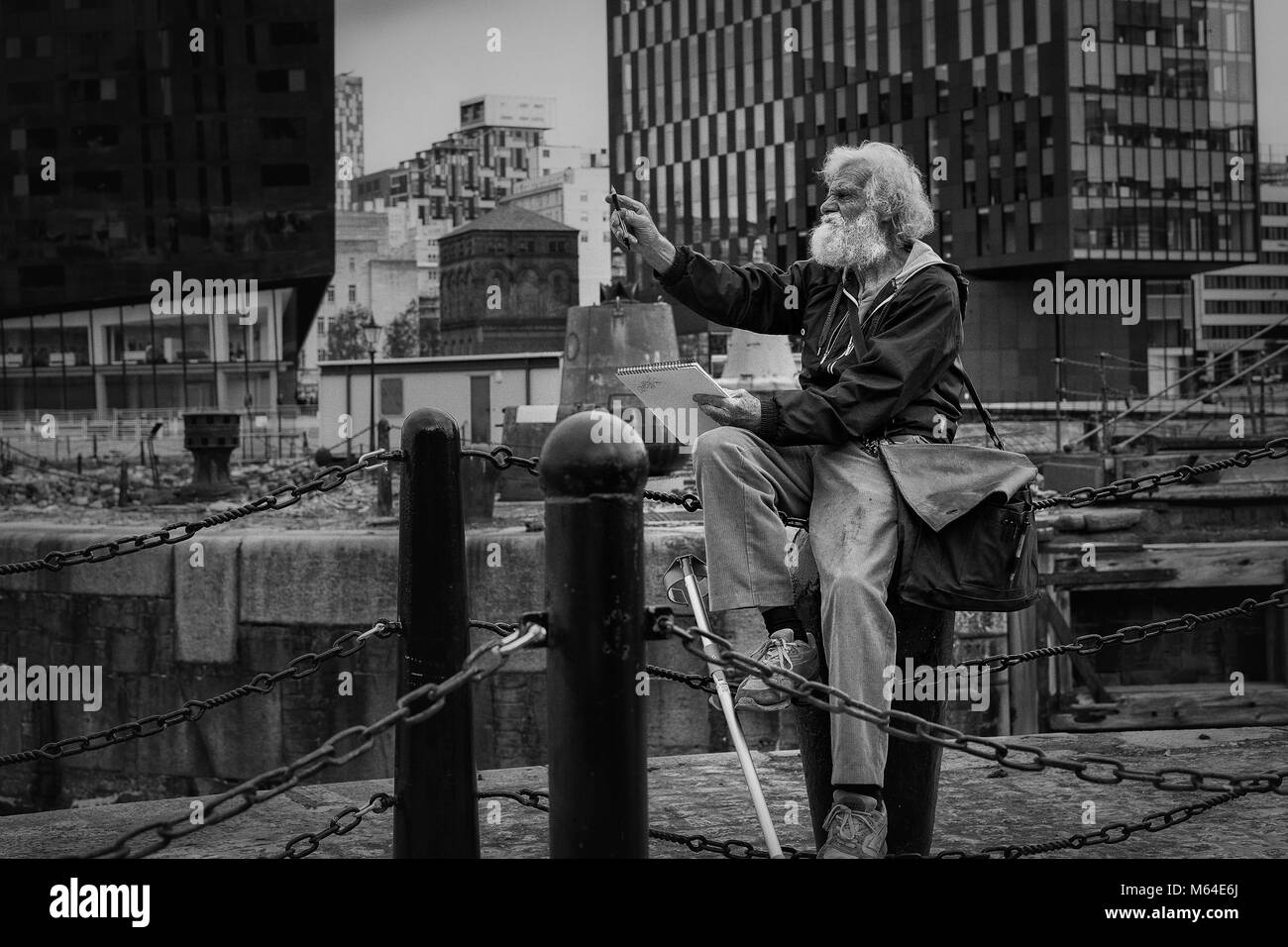 Artist at work on the waterfront at Liverpool Stock Photo