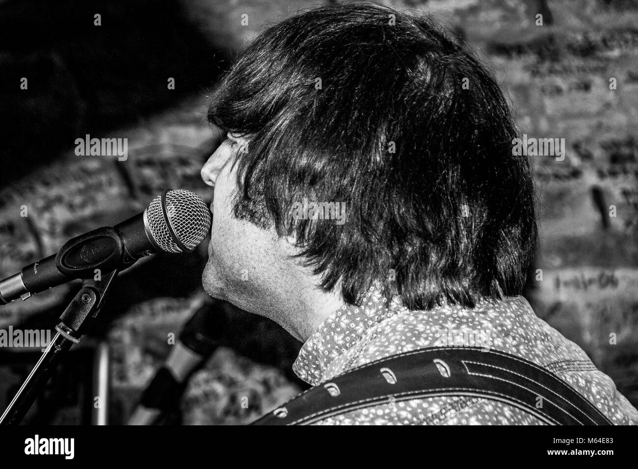 Guitarists performing inside the Cavern Club, Liverpool UK Stock Photo