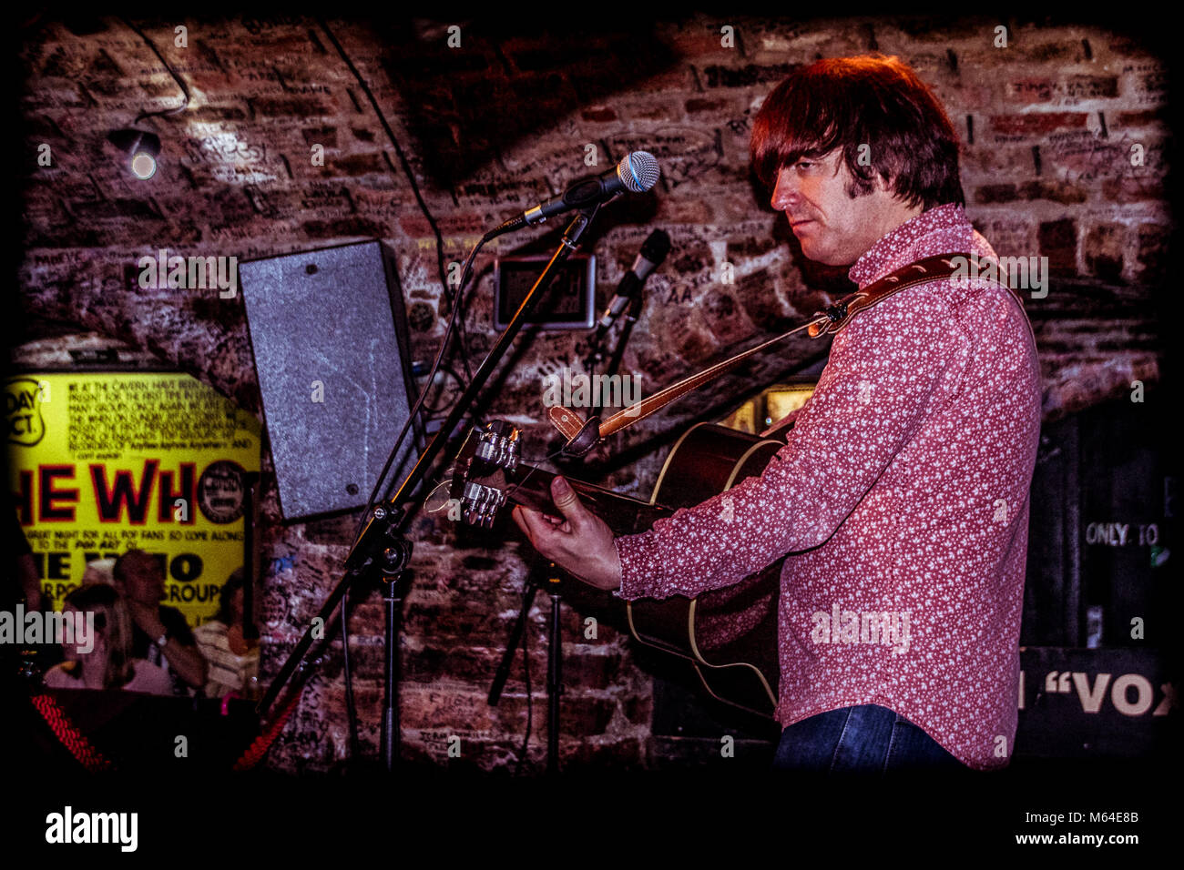 Guitarists performing inside the Cavern Club, Liverpool UK Stock Photo