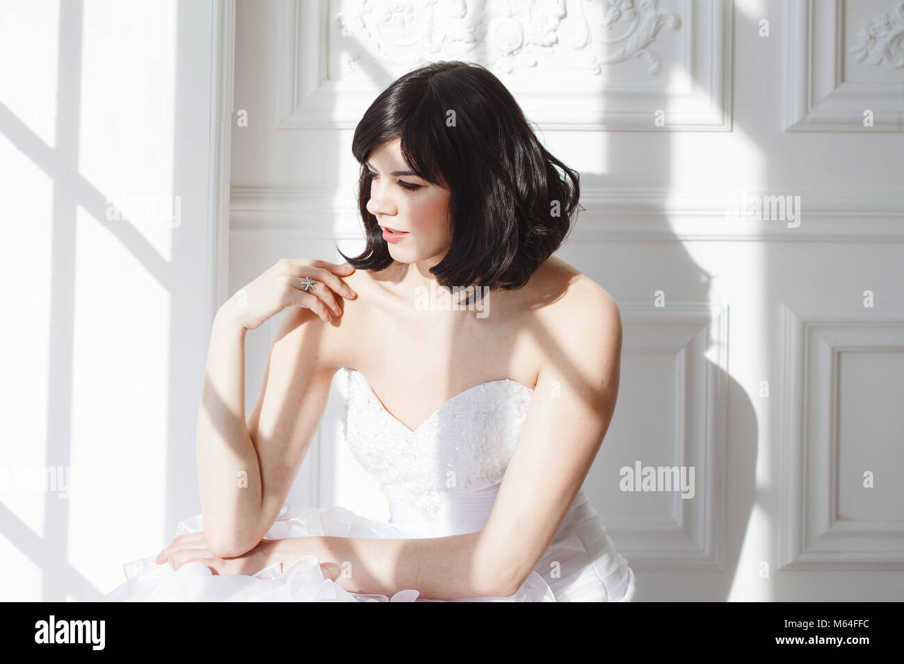 Portrait Of Young Attractive Brunette With Short Hair In A Wedding