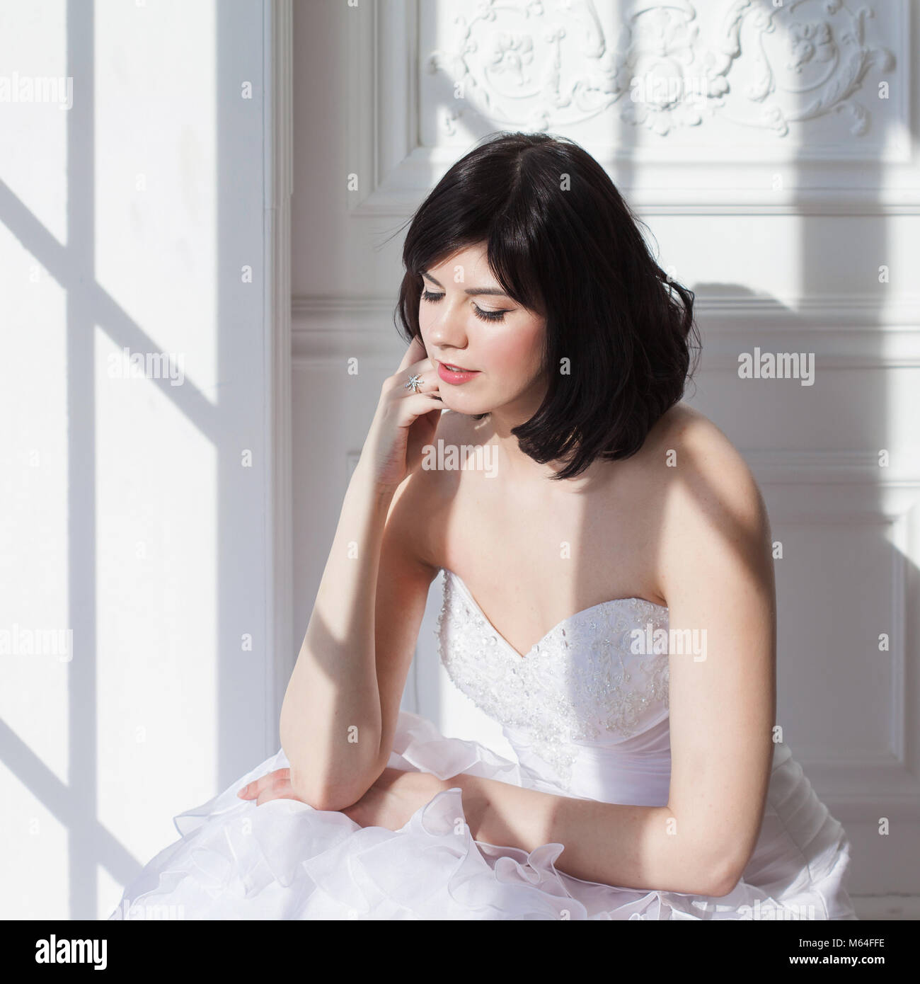 Portrait Of Young Attractive Brunette With Short Hair In A Wedding