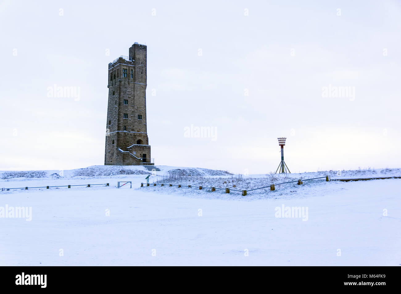 Victoria Jubilee Tower on Castle Hill, Huddersfield  in the freezing snow Stock Photo