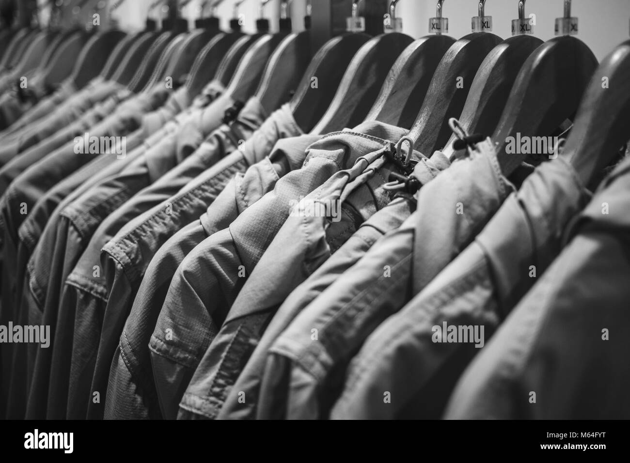 Clothing rack display Black and White Stock Photos & Images - Alamy