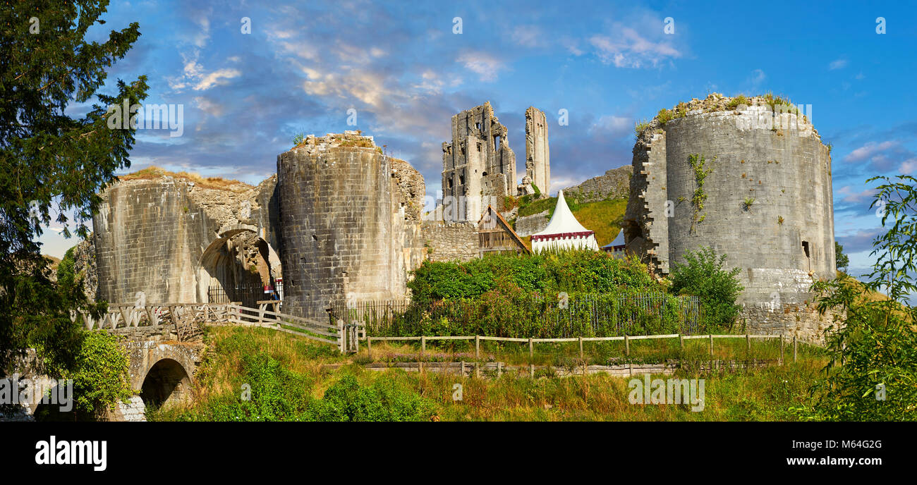 Medieval Corfe castle keep at sunrise, built in 1086 by William the Conqueror, Dorset England Stock Photo