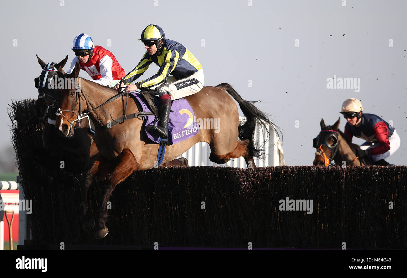 Go Conquer ridden by jockey Aidan Coleman (centre) in action during the Betdaq Handicap Chase Stock Photo
