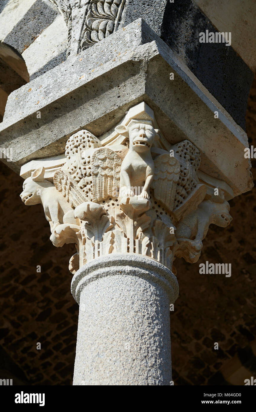Picture and image of the Tuscan Romanesque Pisan style basilica of Santissima Trinita di Saccargia, historicated pillar capitals, consecrated 1116, Co Stock Photo
