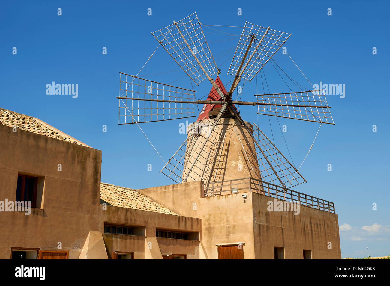 Mulino d’Infersa (mill of Infersa) wind mill, Ettore saltworks,  Saline della Laguna, Masala, Sicily. Stock Photo