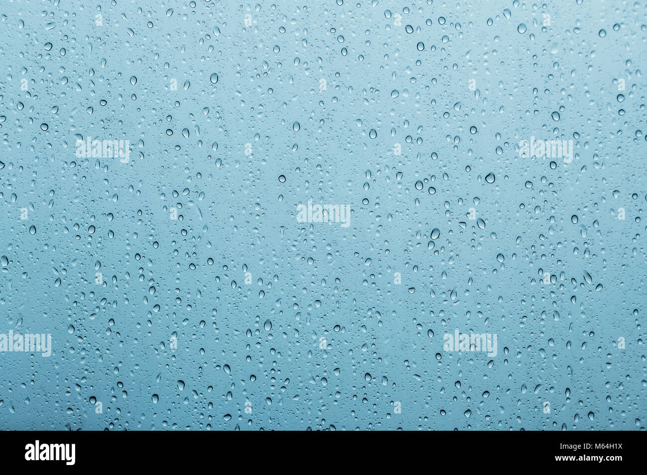 Small Drops Little drops of water, in the blue glass Stock Photo - Alamy