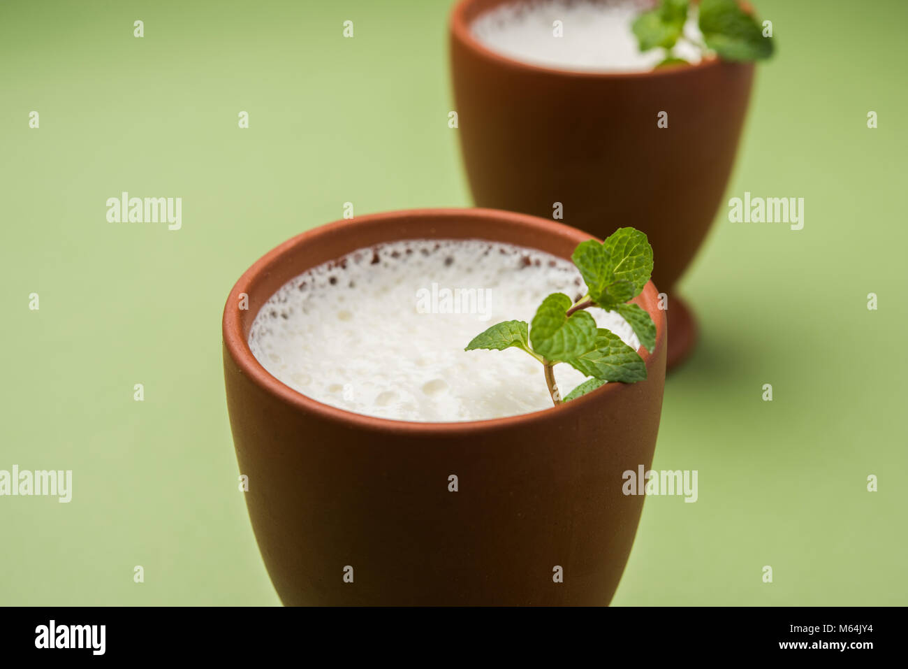Lassie or lassi in terracotta glass Lassi is an Authentic Indian cold