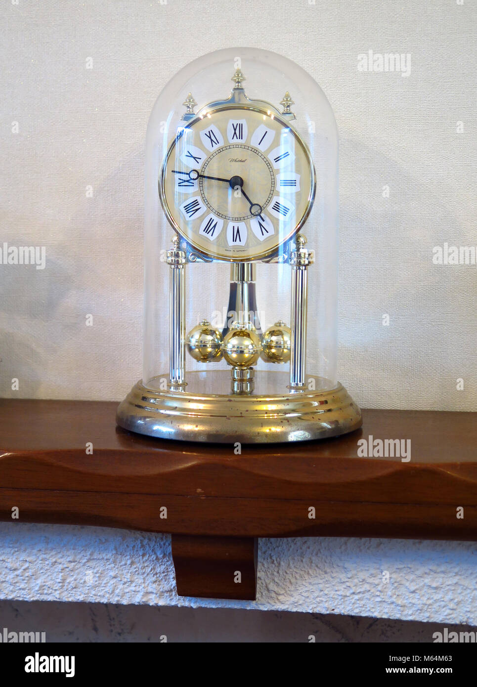 Clock on a mantlepiece Stock Photo Alamy