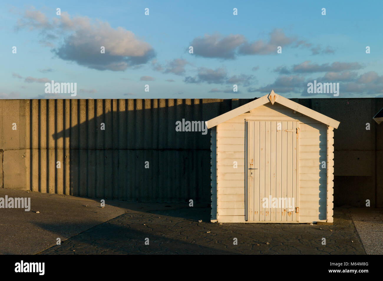 Beach hut in morning sun, Normandy, France Stock Photo