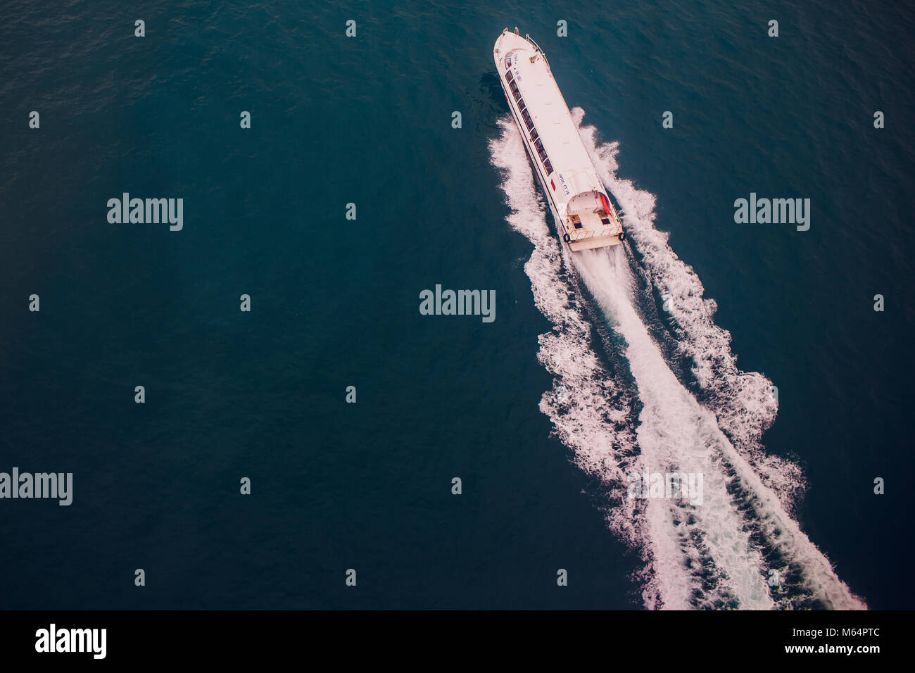 Top view of a boat sailing in the blue sea Stock Photo - Alamy